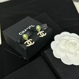 Chanel leather bow 🎀 double C earrings